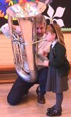 Little Girl Playing Tuba